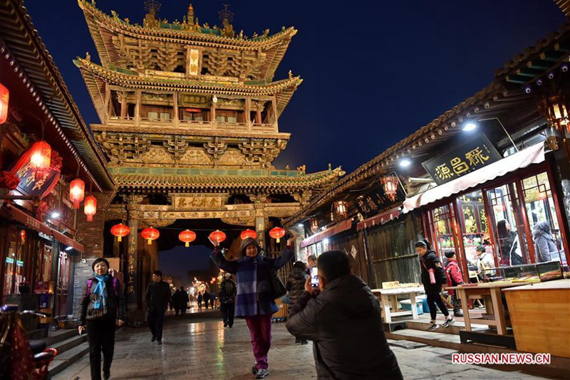 В дни Праздника Весны древний город Пинъяо привлекает многих туристов