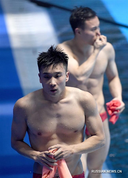 18-е Азиатские игры -- Синхронные прыжки в воду /3 м/ среди мужчин: китайские спортсмены Цао Юань и Се Сыи заняли первое место