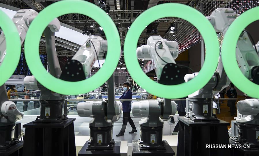 Китайское международное импортное ЭКСПО -- "Объятья", открытые для будущего