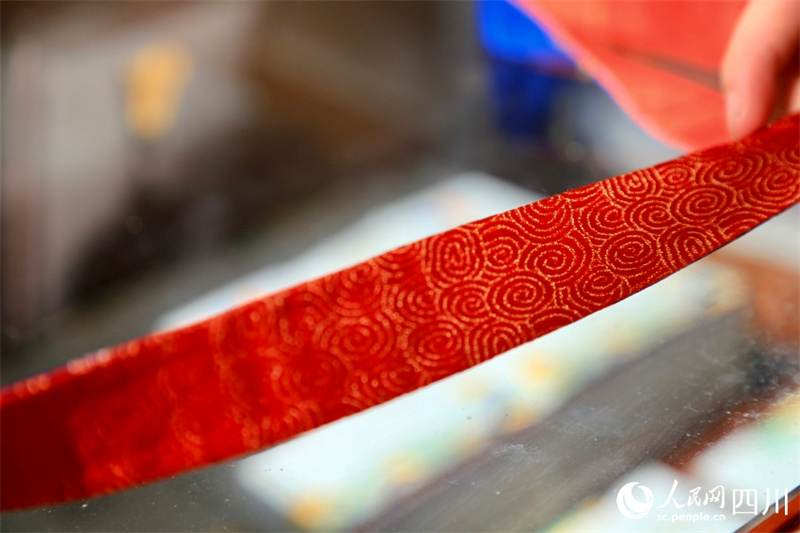 Изящество медальных лент Всемирной летней Универсиады в Чэнду из сычуаньской парчи